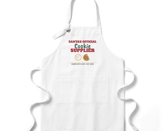 Delantal navideño para hornear, Proveedor oficial de galletas de Papá Noel, Delantal de cocina divertido para mujeres, Regalo para reposteros, Regalo para anfitriones navideños