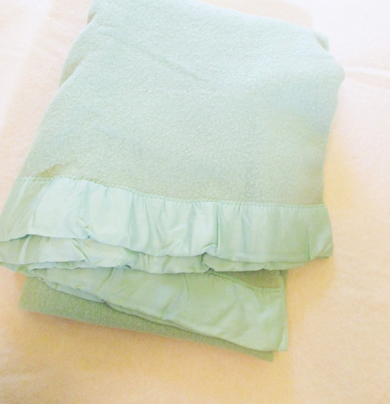 A Mint Green Wool Blanket With Satin Binding Soft Felted Etsy