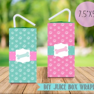 May include: Two printable juice box wrappers featuring a paw print pattern. The wrapper on the left is teal with a pink bone icon. The wrapper on the right is pink with a teal bone icon. Both wrappers are 7.5 inches by 5 inches. DIY Juice Box Wrappers.