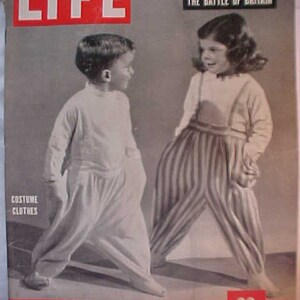 May include: A black and white photo from a LIFE magazine cover featuring two children in costume clothes. The cover text reads "In this issue CHURCHILL'S MEMOIRS THE BATTLE OF BRITAIN" and "FEBRUARY 28, 1949 20 CENTS YEARLY SUBSCRIPTION $6.00".