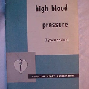 May include: A blue and white pamphlet titled "high blood pressure (hypertension)" with the American Heart Association logo. The logo is a white heart with a torch inside.