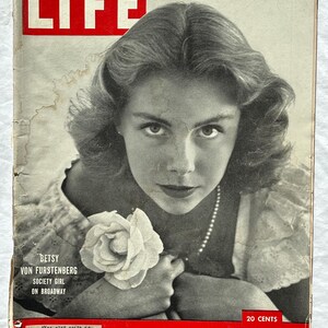 May include: A vintage January 29, 1951, issue of LIFE magazine featuring a black and white portrait of Betsy Von Furstenberg holding a white rose. The cover includes the text Communist Power in France, 20 Cents, and a circulation over 5,200,000.