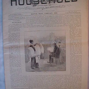 May include: A black and white illustration from a vintage magazine depicting two people in a room. A woman in a long dress is standing and holding a large roll of fabric. A man in a suit is sitting in a chair and reading a book. The magazine is titled "The Household" and the date is February 1882.