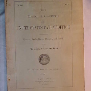 May include: A black and white image of the cover of the "Official Gazette of the United States Patent Office" from August 10, 1880. The cover features the text "The Official Gazette of the United States Patent Office" and "Patents, Trade-Marks, Designs, and Labels".