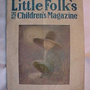 May include: A vintage cover of Little Folk's The Children's Magazine from November 1913. The cover features a color illustration of a young girl wearing a large, wide-brimmed hat, sitting in a field of tall grass.