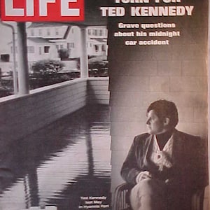 May include: A black and white photo of Ted Kennedy on the cover of LIFE magazine. The headline reads "The Fateful Turn for Ted Kennedy" and "Grave questions about his midnight car accident".