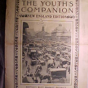 May include: A black and white photo of a busy street scene in Boston's Market District. The photo is from the early 1900s and shows horse-drawn carriages, automobiles, and pedestrians.
