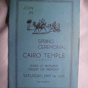 May include: A blue and white announcement for a Spring Ceremonial at the Cairo Temple, AAONMS, Oasis of Rutland, Desert of Vermont. The event is scheduled for Saturday, May 19, 1956. The announcement features an illustration of a camel caravan.
