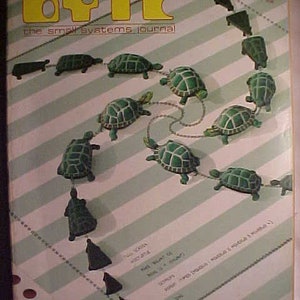May include: A vintage magazine cover featuring the text "BYTE the small systems journal" in yellow letters on a green and white striped background. A chain of green turtles is depicted on the cover, with the turtles facing different directions.