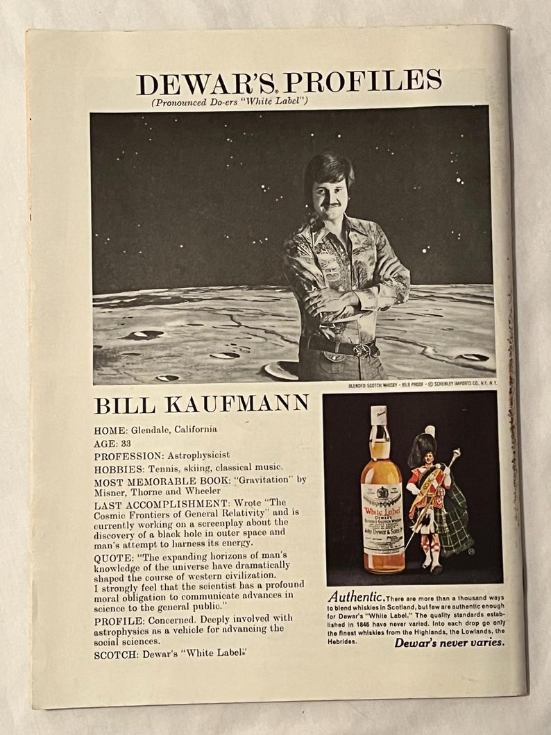 May include: Vintage magazine advertisement for Dewar's Scotch whisky. The ad features a portrait of Bill Kaufmann, an astrophysicist, and a bottle of Dewar's White Label Scotch. Text includes the Dewar's Profiles logo and the tagline "Dewar's never varies."