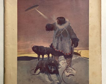 Può includere: Copertina vintage della rivista "The Literary Digest" dell'11 luglio 1925. L'illustrazione raffigura una persona in abiti artici con cani da slitta e un dirigibile. Il testo recita "A Polar Possibility". La rivista è di colore beige.