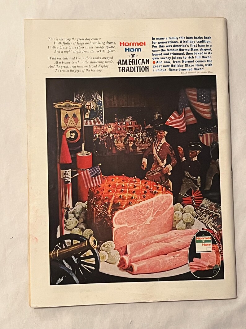 May include: An advertisement for Hormel Ham, featuring a cooked ham with slices, surrounded by patriotic imagery. The ad includes text about the ham's flavor and tradition, with a small inset image of the product.