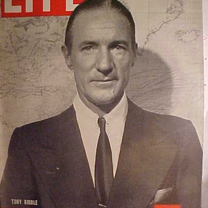 May include: LIFE magazine cover featuring a portrait of Tony Biddle. The magazine's title is in large white letters on a red background. The cover also includes the date October 4, 1943, and the price of 10 cents.