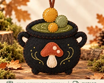 May include: A black felt cauldron ornament featuring a brown mushroom appliqué on the front, green felt liquid inside, and three small felt spheres on top. The item includes a brown hanging loop and the text FELT SEWING PATTERN INSTANT DOWNLOAD.