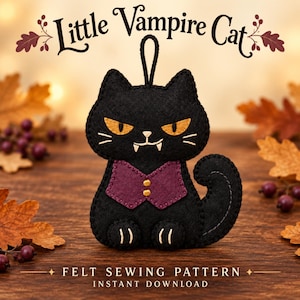 May include: A black felt cat ornament with orange eyes and white fangs, wearing a purple vest with two gold buttons. The text Little Vampire Cat and Felt Sewing Pattern Instant Download is visible above and below the cat figure.