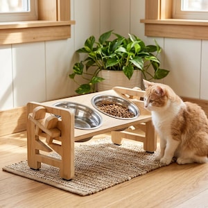 May include: A light-colored wooden elevated pet feeder stand featuring two circular stainless steel bowls. One bowl contains dry brown kibble, while the other is empty. The stand has a cutout design on the sides and sits on a woven mat.
