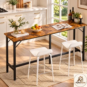 May include: A tall rectangular bar table with a rustic brown wood-grain surface and a black metal frame, accompanied by two white molded plastic bar stools with metal legs, positioned on a woven rug in a kitchen setting.