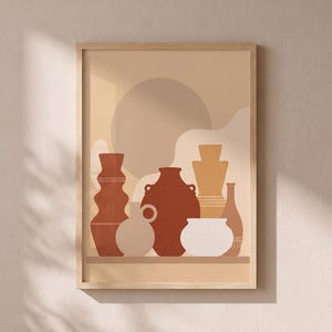 May include: A framed wall art print featuring a collection of six ceramic vessels in shades of terracotta, beige, and cream. The artwork displays a large circular shape in the background and various vase silhouettes arranged on a flat surface.