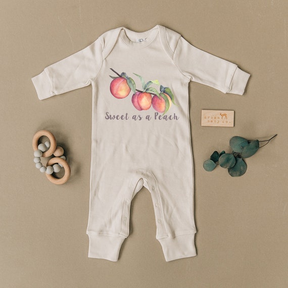 baby clothes with peaches