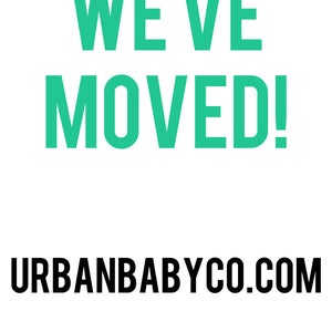 May include: A green and white graphic announcing that a business has moved. The text reads "We've Moved!" and the website address "urbanbabyco.com" is displayed below.