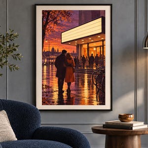 May include: A framed wall art print depicting a couple standing before a brightly lit theater marquee at sunset. The scene features a wet city street reflecting warm orange and purple sky colors, with silhouettes of people and bicycles nearby.