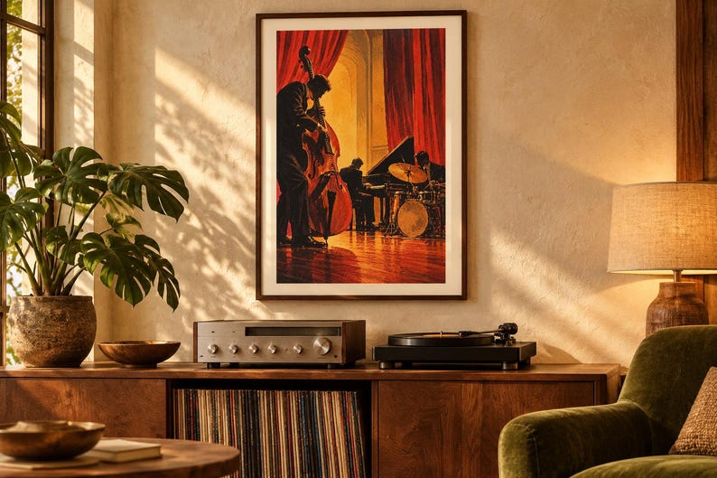 May include: A framed vertical wall art print depicting a jazz trio performing on a stage with red curtains. The scene features a double bass player in the foreground, a pianist, and a drummer, all rendered in warm orange and deep red tones.