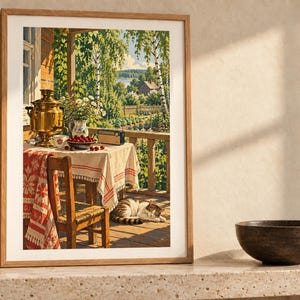 May include: A framed art print depicting a sunlit wooden porch with a table covered by a white and red patterned tablecloth. On the table sits a brass samovar, a bowl of red cherries, a vase of white flowers, and a radio. A cat sleeps on the floor.