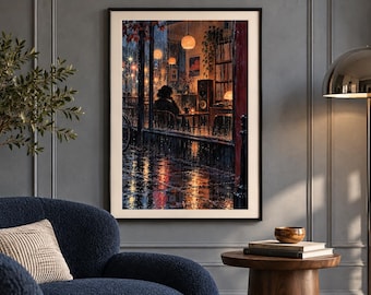 May include: A framed wall art print depicting a rainy evening scene viewed through a window. The artwork shows a person sitting inside a warm, dimly lit cafe with glowing pendant lights, while rain streaks the glass and reflects city lights.