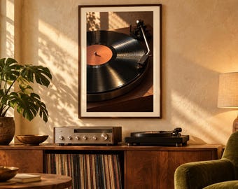 May include: A framed wall art print featuring a close-up of a black vinyl record spinning on a turntable with a copper-colored center label. The artwork is displayed above a wooden media console containing a silver receiver and a black turntable.