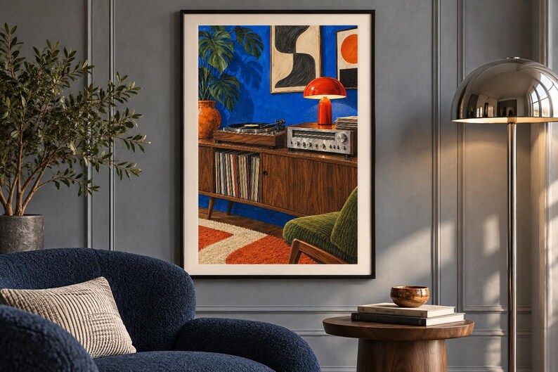 May include: A framed art print depicting a vibrant blue room with a wooden media console, a record player, a vintage receiver, a red mushroom lamp, a green armchair, a monstera plant, and abstract wall art above a patterned orange and white rug.