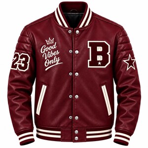 May include: A burgundy varsity jacket with white striped ribbed trim on the collar, cuffs, and hem. It features silver snap buttons, the number 23, a crown icon, the text Good Vibes Only, a large letter B, and a star graphic.