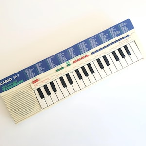 Vintage 90s Casio Synthesizer SA-7 100 Sound Tone Bank Electronic