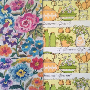 May include: The image shows two contrasting patterns. One is a detailed floral embroidery with pink, blue, orange, and purple flowers. The other is a repeating pattern with kitchen illustrations, including teapots, jars, and the text "Someone Special" and "A Shower Gift for Someone".