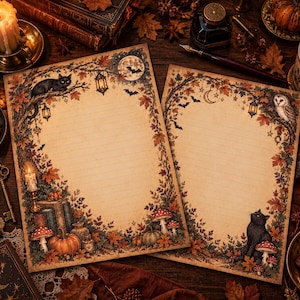 May include: Two sheets of lined stationery featuring an autumnal border with illustrations of a black cat, a barn owl, pumpkins, mushrooms, hanging lanterns, bats, and a full moon. The paper has a vintage, aged parchment appearance.
