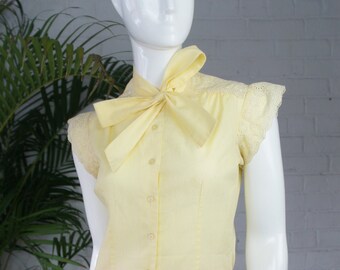 pastel yellow blouse