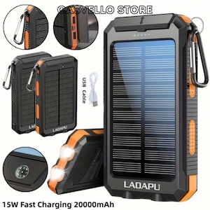 Puede incluir: Un cargador solar portátil negro y naranja con capacidad de 20000mAh y carga rápida de 15W. El dispositivo incluye un panel solar, linterna LED, brújula y un mosquetón. El texto CASVELLO STORE, LADAPU y USB Cable es visible en la imagen.
