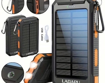 May include: A black and orange solar power bank with a 20000mAh capacity and 15W fast charging. The device features a solar panel, integrated LED flashlight, a compass, and a carabiner. The text CASVELLO STORE, LADAPU, and USB Cable are visible.