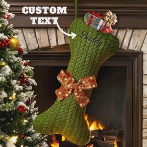 May include: A green cable-knit dog bone-shaped stocking featuring a large orange and white polka dot bow. The stocking is embroidered with the name Buddy and contains small gift boxes. The text CUSTOM TEXT is visible in the upper left corner.
