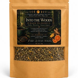 May include: A brown stand-up pouch containing 50 g of Into The Woods black tea blend. The label features a forest illustration, a cup of tea, ginger, and orange slices. Text includes brand name, ingredients, and brewing instructions for the tea.