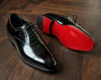 Maßgefertigter Herren-Oxfordschuh aus schwarzem Kalbsleder, handgefertigt