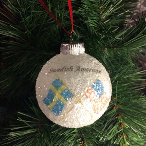 Swedish and America Flags glass glitter ornament