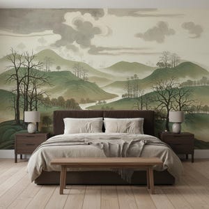 May include: A bedroom featuring a dark brown upholstered bed with a light gray blanket, a wooden bench at the foot, and two dark brown nightstands with lamps. The wall displays a mural of green rolling hills, trees, and clouds.