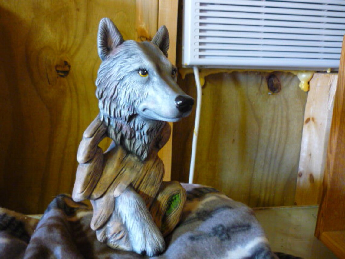 ceramic wolf statue