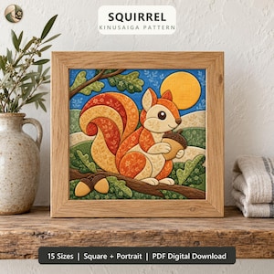 May include: A framed Kinusaiga pattern art piece featuring a squirrel holding an acorn, set against a blue sky with a yellow sun, green hills, and oak leaves. The text SQUIRREL KINUSAIGA PATTERN and 15 Sizes Square + Portrait PDF Digital Download appear.