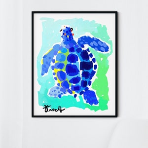 May include: A framed abstract painting of a blue sea turtle with a green and blue background. The artist's signature is visible in the bottom left corner.