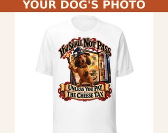 May include: A white t-shirt featuring a graphic of a dachshund wearing a wizard hat and holding a staff in front of an open refrigerator. The text reads: CUSTOMIZED WITH YOUR DOG'S PHOTO, YOU SHALL NOT PASS UNLESS YOU PAY THE CHEESE TAX.