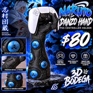 May include: A black, textured arm-shaped controller holder featuring multiple embedded blue Sharingan eyes, designed to support a white and black game controller. The base includes text reading Naruto Danzo Hand PS5 Controller Holder.