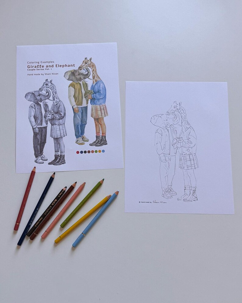 May include: Two sheets of paper featuring line art and colored illustrations of a giraffe and elephant couple. One sheet shows the characters in full color with the text "Coloring Examples Giraffe and Elephant Couple Series Vol. 1". Seven colored pencils are arranged below.