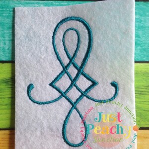 May include: A teal blue embroidered design of a stylized knot on a white fabric background. The design is surrounded by the text "Just Peachy Junction" repeated in a circle.