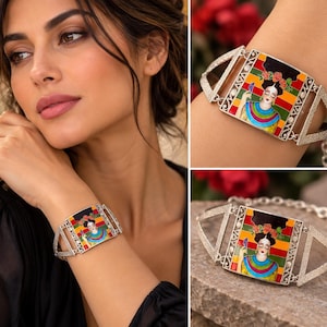 May include: A silver-toned bracelet featuring a central rectangular plaque with a colourful enamel portrait of a person with dark hair adorned with red flowers. The background consists of horizontal stripes in red, yellow, and green colours.